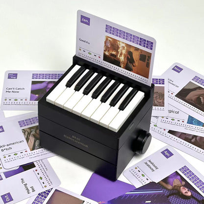 2025 Olivia mini piano calendar with 15 keys and music cards