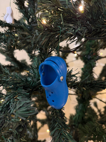 Mini colorful Croc Christmas ornament hanging on tree